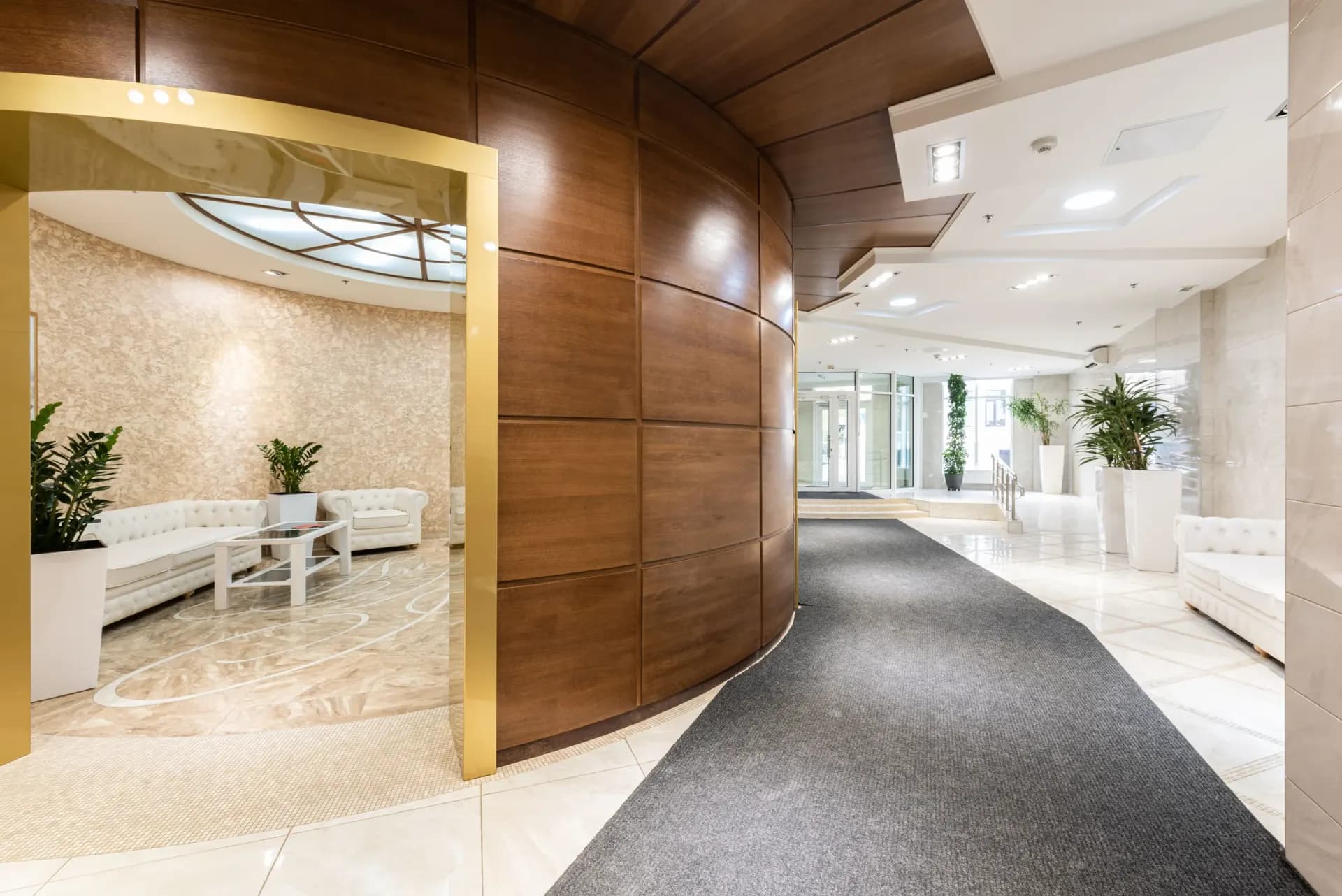 Modern bank lobby in BC by Pro Construction Group