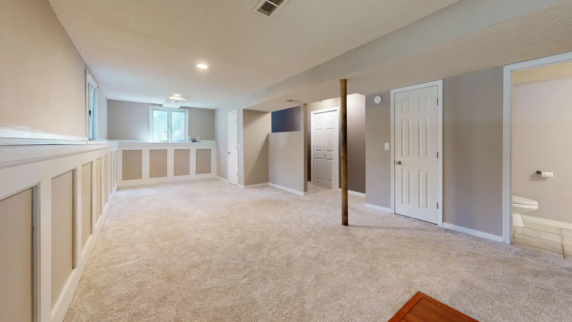 Basement living space in BC by Pro Construction Group