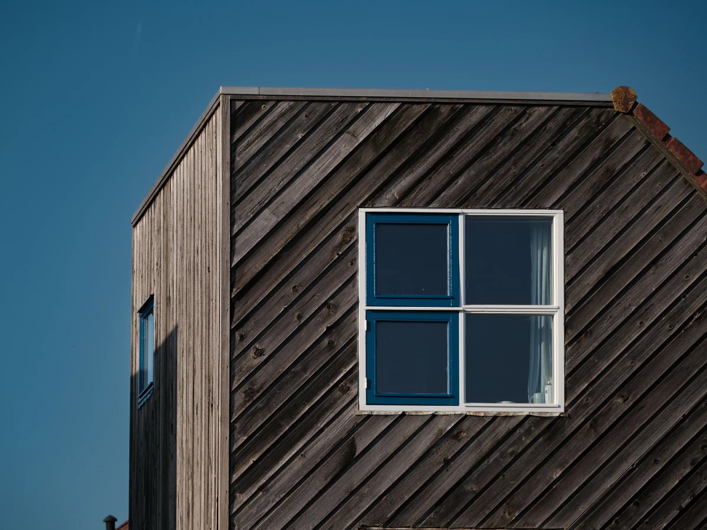 Modern home exterior in BC by Pro 1 Construction