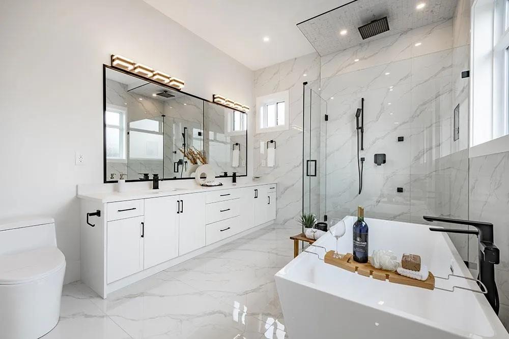 Primary ensuite with double vanity, soaker tub and walk-in shower in a Crescent Beach custom home, South Surrey BC