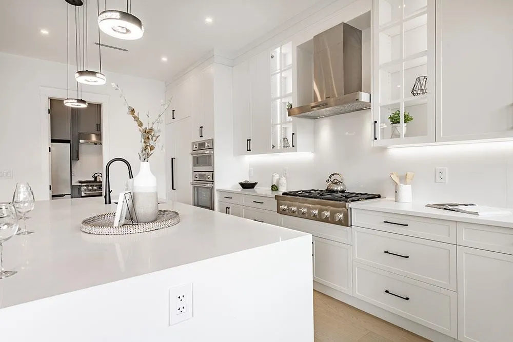 Thermador six-burner range and white shaker cabinetry in a Crescent Beach custom home kitchen, South Surrey BC