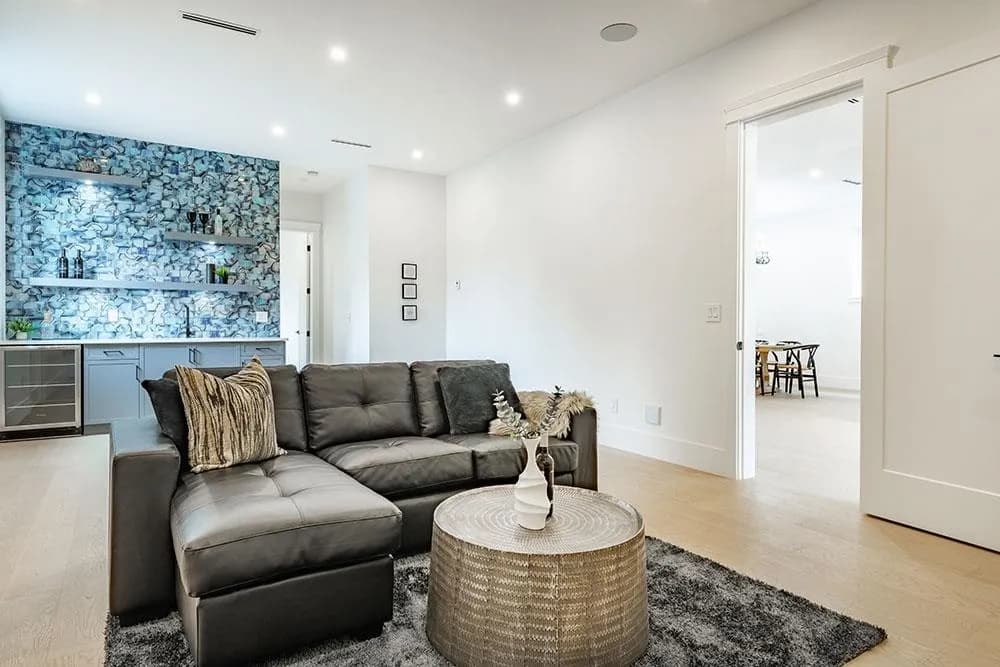 Theatre room with sectional seating and wet bar at 12676 25 Avenue, Crescent Beach, South Surrey