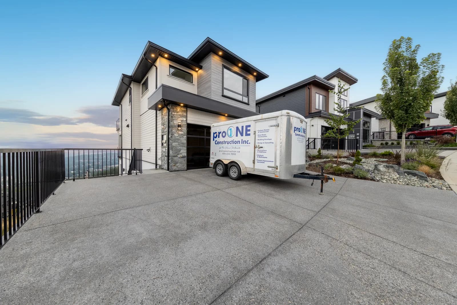 Pro One Construction site trailer in the driveway of the completed custom home at 2185 Navigators Rise, Bear Mountain, Langford BC