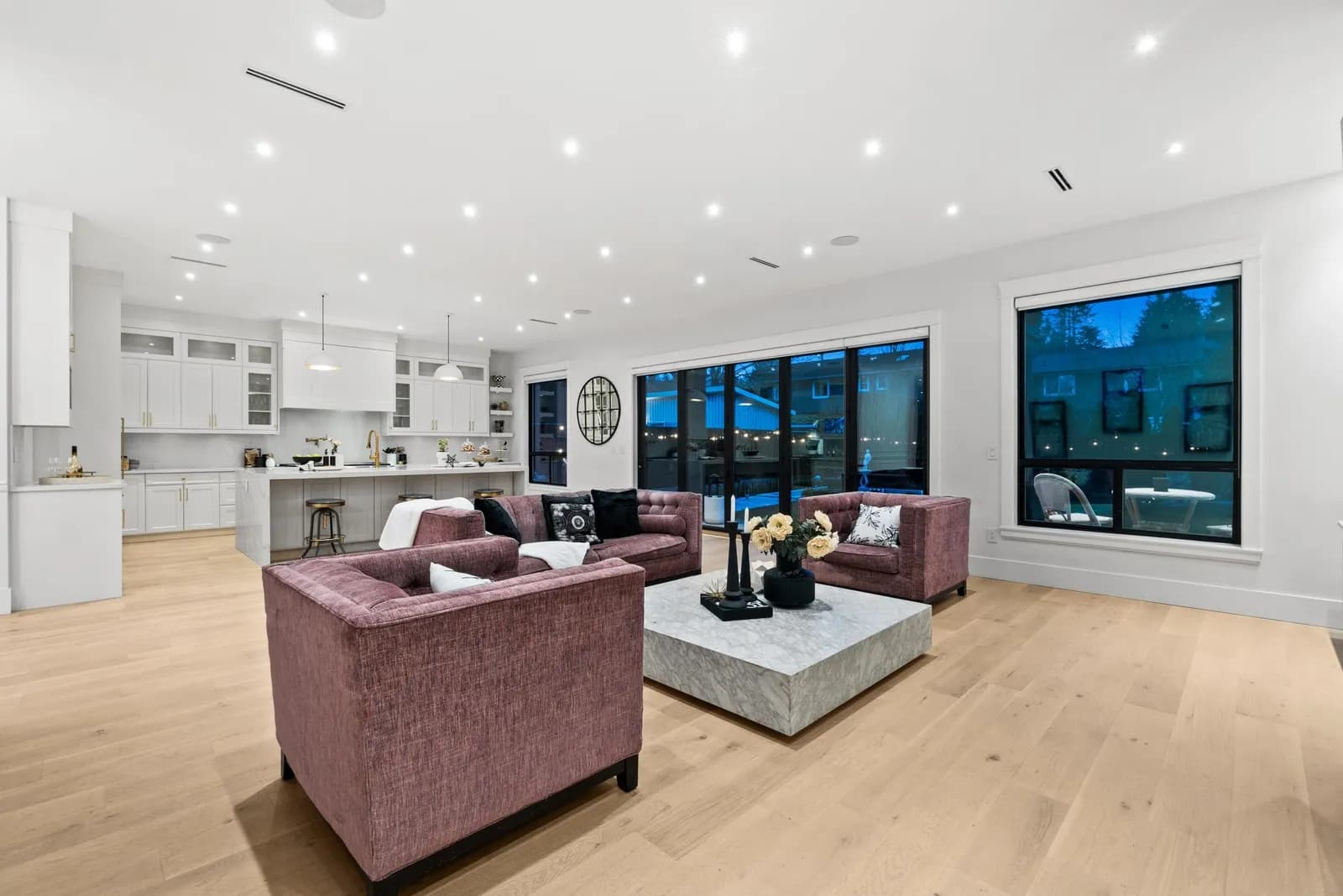 Open-concept great room with 10-foot ceilings, engineered hardwood and fireplace wall at 12686 25 Avenue, Crescent Beach, South Surrey